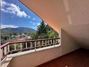 a balcony with a view of a mountain at La Cava en Isla - 5611 in Isla