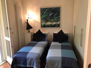 A bed or beds in a room at Maison de Maff