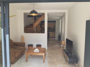 Μια τηλεόραση ή/και κέντρο ψυχαγωγίας στο Maison de charme face au Canal