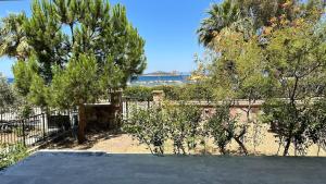 a skateboard ramp in front of a fence and trees at Relaxing Stay by the Beach in Ayvalık