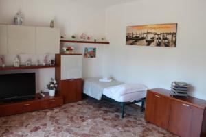 A bed or beds in a room at VENICE Sweet Home - your home in a beautiful neighborhood of the City of Venice