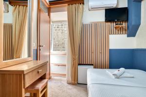 Postel nebo postele na pokoji v ubytování Hotel Rendez Vous