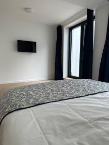 Krevet ili kreveti u jedinici u okviru objekta Room with ensuite and garden