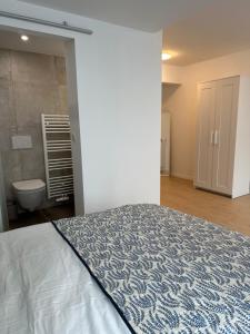Krevet ili kreveti u jedinici u okviru objekta Room with ensuite and garden
