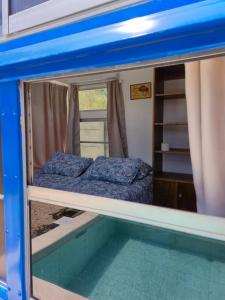 a view of a bunk bed in a room at Bus hotel Playa Barrigona, entre Sàmara y Nosara in Nicoya