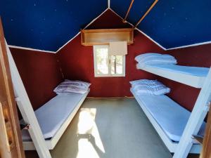 a room with three bunk beds in a house at Yacht Club Bezdrev in Hluboká nad Vltavou +29 photos