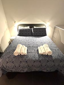 Ένα ή περισσότερα κρεβάτια σε δωμάτιο στο FabFour Apt CENTRALE - Piazza Fontana +31 φωτογραφίες