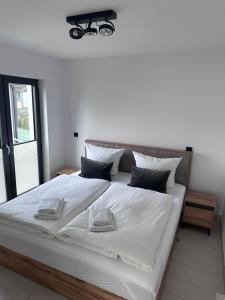 Postel nebo postele na pokoji v ubytování Meerblick-Residence-Appartement 6