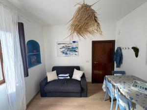 A seating area at Appartamento con vista mare a Porto Santo Stefano