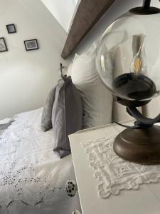 Postel nebo postele na pokoji v ubytování Chambres d'hotes Le relais globe trotteur