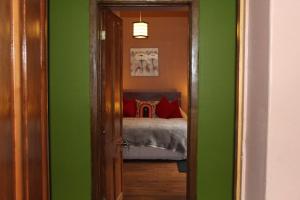 Postel nebo postele na pokoji v ubytování Casa En La Precordillera