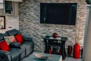 TV a/nebo společenská místnost v ubytování PPM BnB