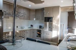 Kuchyň nebo kuchyňský kout v ubytování PPM BnB