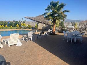 Bazén v ubytování Villa Berkania piscine privée - 8 pers nebo v jeho okolí