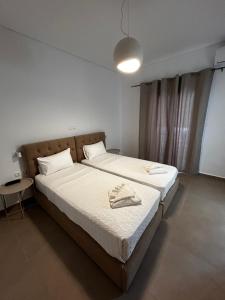 Galini Hotel Bed and Breakfast客房内的一张或多张床位