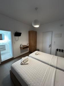 Galini Hotel Bed and Breakfast客房内的一张或多张床位