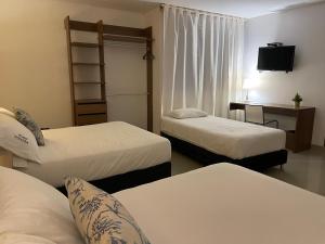 Hotel Soleira客房内的一张或多张床位
