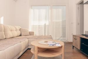 Zona de estar de L & S Apartmani