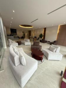 Ruang duduk di Afaq Retaj Serviced Apartments