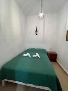 A bed or beds in a room at Το αρχοντικό της Ιωάννας ΙΙ