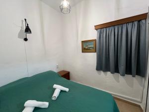 A bed or beds in a room at Το αρχοντικό της Ιωάννας ΙΙ