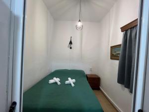 A bed or beds in a room at Το αρχοντικό της Ιωάννας ΙΙ