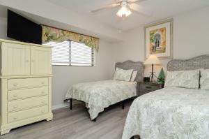 Voodi või voodid majutusasutuse Island Daze by Bryant Real Estate toas +20 fotot