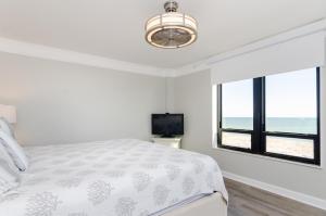 Voodi või voodid majutusasutuse 6C by the Sea by Bryant Real Estate toas +19 fotot