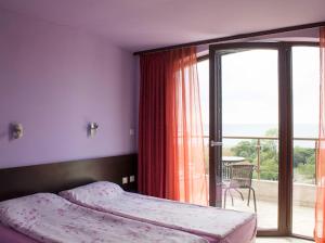 Postel nebo postele na pokoji v ubytování Silistar Hotel