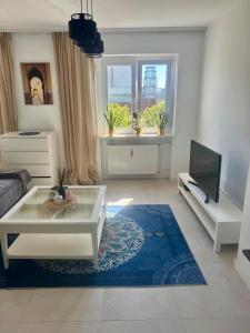 Et tv og/eller underholdning på Apartament OGRODOWA 9 - Old Town - MTP