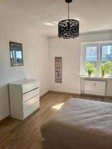 En eller flere senge i et værelse på Apartament OGRODOWA 9 - Old Town - MTP + 14 billeder