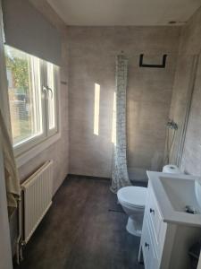 Koupelna v ubytování Bellas House