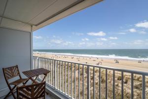 a balcony with a view of the beach at Barefoot Country 404 - Serenity Now in Ocean City