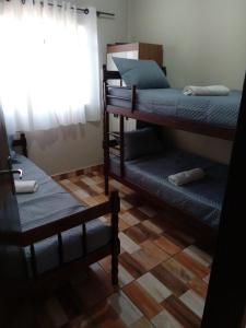 Postel nebo postele na pokoji v ubytování Pousada rancho 2d