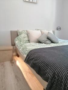 Postel nebo postele na pokoji v ubytování Apartament Mako