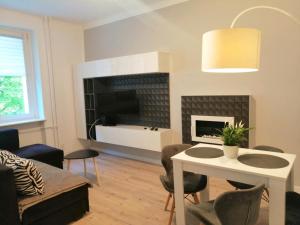 TV a/nebo společenská místnost v ubytování Apartament Mako