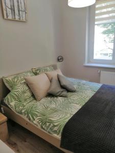 Postel nebo postele na pokoji v ubytování Apartament Mako