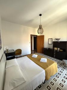 Posteľ alebo postele v izbe v ubytovaní Archimede Lounge