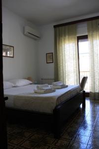 Posteľ alebo postele v izbe v ubytovaní Archimede Lounge