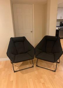A seating area at Finished 2 BR Apartment in an Upscale Area of Ajax