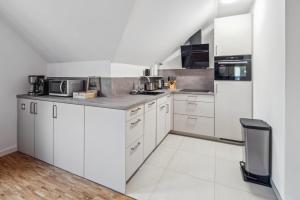 Η κουζίνα ή μικρή κουζίνα στο maremar - Style nahe Klinikum - Luxus Boxspring - Parkplatz - Küche - Highspeed WLAN - bis zu 5P