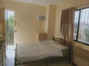 Postel nebo postele na pokoji v ubytování Emanet Apartelle