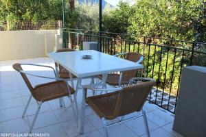 A balcony or terrace at Rentoulia Apartments