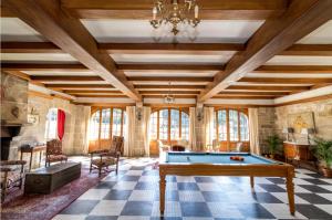 Posezení v ubytování Manoir Du Stang