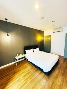 Postel nebo postele na pokoji v ubytování The Summer Suite KLCC