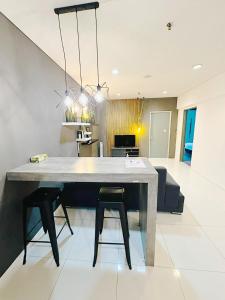 Kuchyň nebo kuchyňský kout v ubytování The Summer Suite KLCC