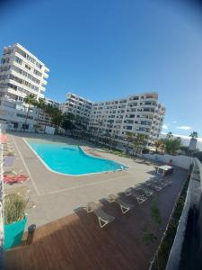 Bassein majutusasutuses Piso con Piscina comunitaria või selle lähedal