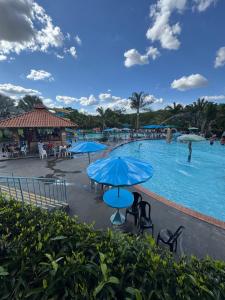 Hồ bơi trong/gần Apartamento Clube Tô de Boa