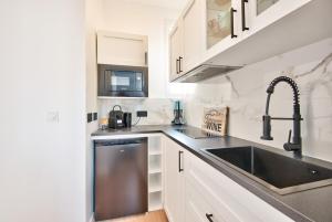 Η κουζίνα ή μικρή κουζίνα στο Appartement Cosy centre Nice