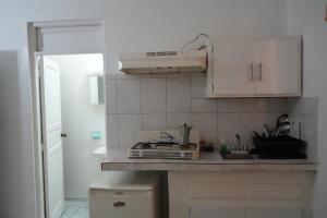 Dapur atau dapur kecil di 102 Cerca del centro histórico y las playas locales